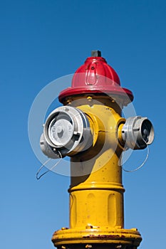 Yellow and red fire hydrant