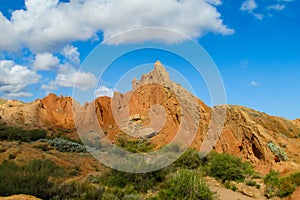 Yellow and red mountain in Asia at rock formation erosion valley