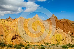 Yellow and red mountain in Asia at rock formation erosion valley