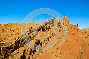 Yellow and red mountain rock formation valley