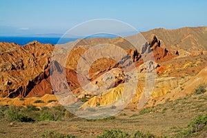 Yellow and red mountain rock formation valley