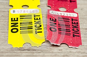 Yellow and red paper tickets