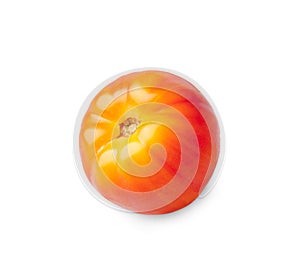 Yellow-red striped tomato on a white background