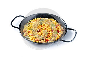 Yellow rice with chicken and vegetables isolated