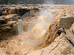 The Yellow River Hukou Waterfall Scenic Area, Hukou Waterfall, known as the `Yellow River Wonders`, is the only yellow waterfall o