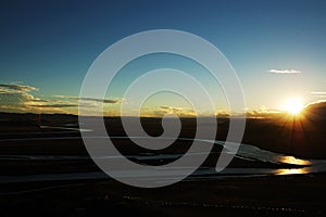 Yellow River on the meadows when sunset