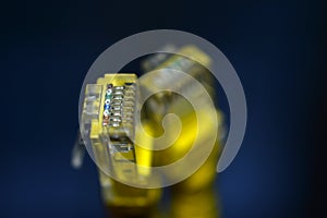 Yellow RJ-45 or ethernet internet cable close-up