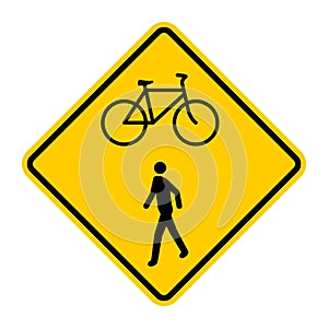 Yellow road sign for pedestrians and cyclists