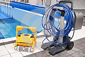 Yellow Robotic Pool Cleaner blue water pool cover