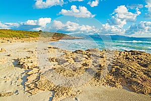 Yellow rocks by Le Bombarde shore