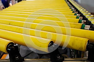 Yellow roller conveyer