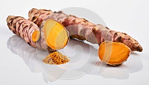 A yellow root with orange peelings on a white background