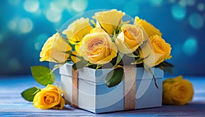 Yellow roses in gift box on a blue background. Flowers for Anniversary, Mother\'s Day or Women\'s Day