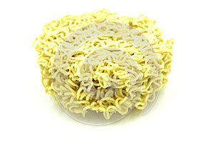 Yellow Round dry instant noodle isolated on white background of file with Clipping Path