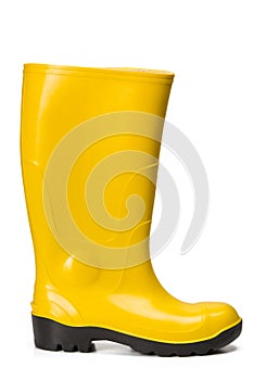 Yellow rubber boots isolated on white background