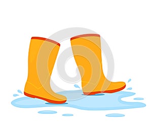 Yellow rubber boots are walking in a puddle with splashing water. vector illustration