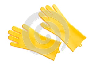 Yellow rubber gloves for cleaning, isolated on white background