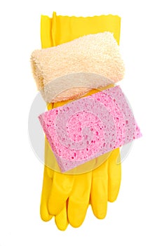 Yellow rubber gloves with sponge and washcloth photo