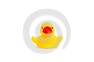A yellow rubber toy duck isolated on a white background