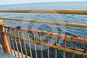 Yellow rusty fence on the seashore, Bosphorus