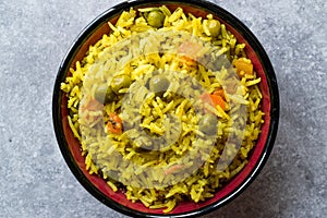 Yellow Saffron Basmati Rice with Turmeric and Vegetables Pilav or Pilaf in Bowl.