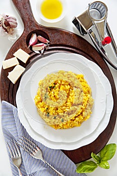 Yellow saffron risotto Milanese. Italian healthy vegetarian dish