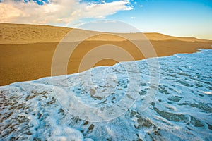 Yellow sand beach, sea and deep blue sky