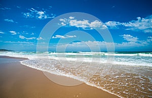 Yellow sand beach, sea and deep blue sky