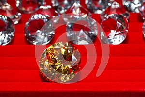 Peridot green diamond on red backgroundYellow sapphire diamond on red background