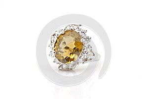 Yellow sapphire ring on white