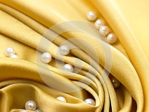 Yellow satin cloth with foldings
