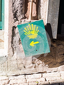 The yellow scallop shell signing the way to Santiago de Compostela in Porto, on the Saint James pilgrimage route