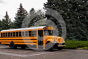 Yellow School Bus Parked On The Street