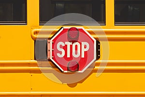 Yellow School Bus with Stop Arm Sign