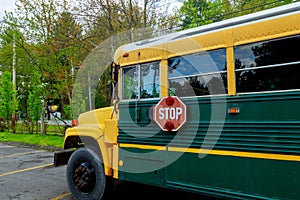 Yellow of school bus in sunny day on parked