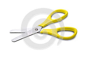 Yellow scissors isolated on white background