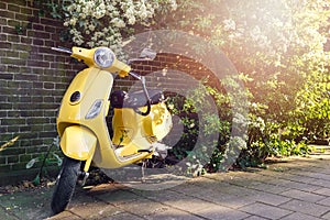 Yellow scooter parked