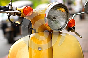 Yellow scooter on street