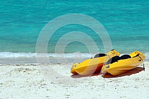 Yellow sea kayaks on the beach