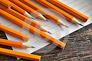 Yellow Sharpened Pencils and Paper