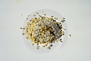 Yellow shelled hemp seeds in a heap