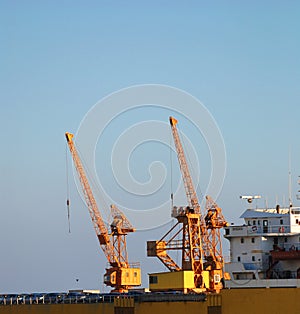 Yellow shipyard cranes