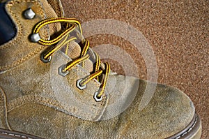 Yellow and shoe strap of old leather footware