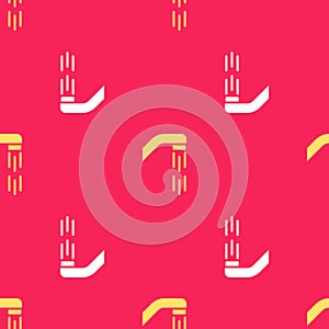 Yellow Shower head with water drops flowing icon isolated seamless pattern on red background. Vector