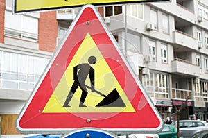 The yellow sign for construction works