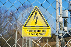 Yellow sign high voltage Danger