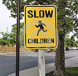 Slow down children plyaing sign