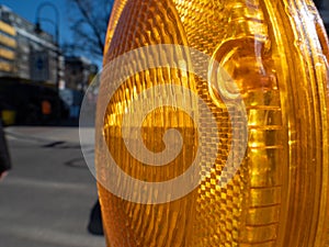 Yellow signal lamp. Road repair. Warning signal at the construction site.