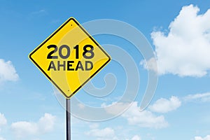 Yellow signpost with text of 2018 ahead