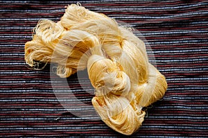 Yellow silk thread traditional sericulture of Thai silk